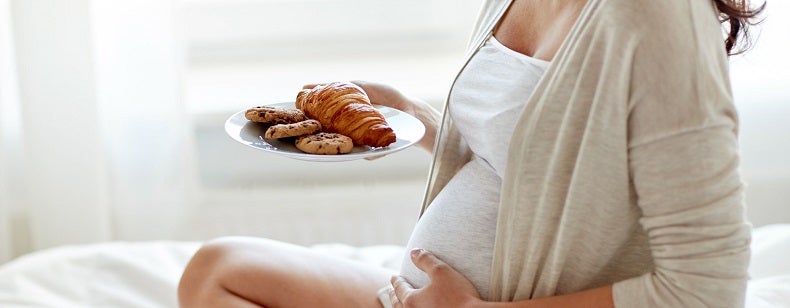 Pregnant Woman Eating Grains